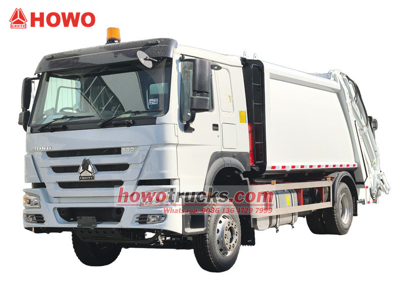 Truk pemadat sampah Howo RHD 14cbm
